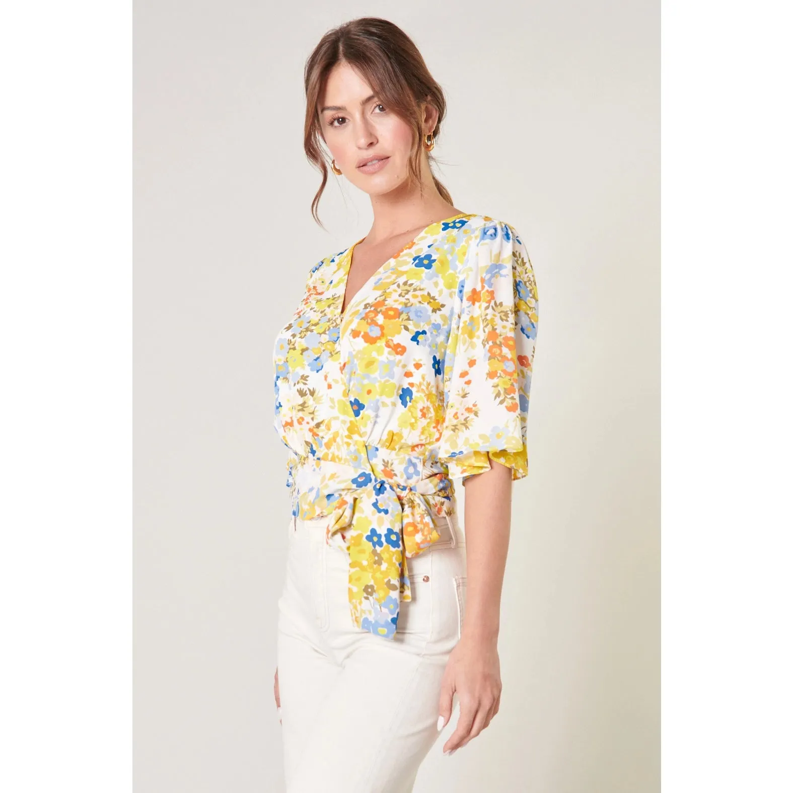 Simmzy Floral Flutter Sleeve Wrap Top